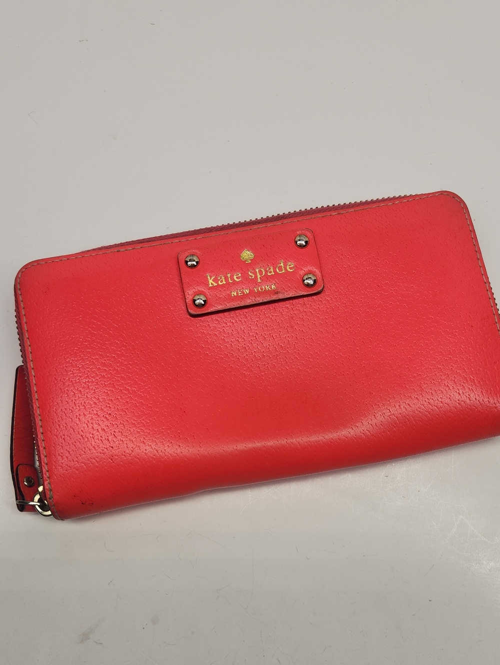 KATE SPADE Hot Pink leather zip wallet with gold logo